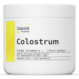 OstroVit Pharma Colostrum 100 g kremowa truskawka